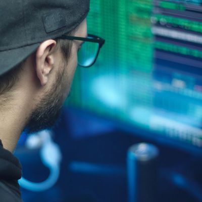 Man organizing digital information on computer screen